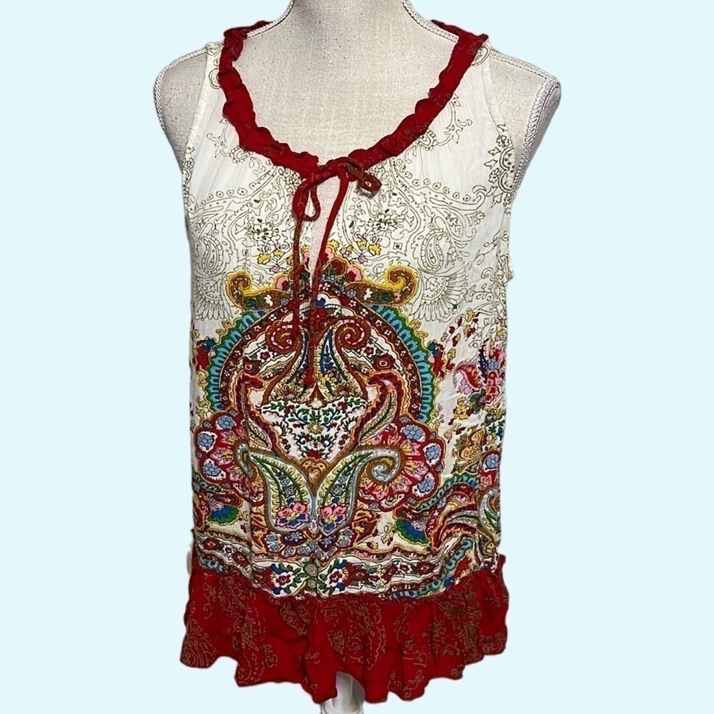 Bila sleeveless top with drawstring neckline. Medium